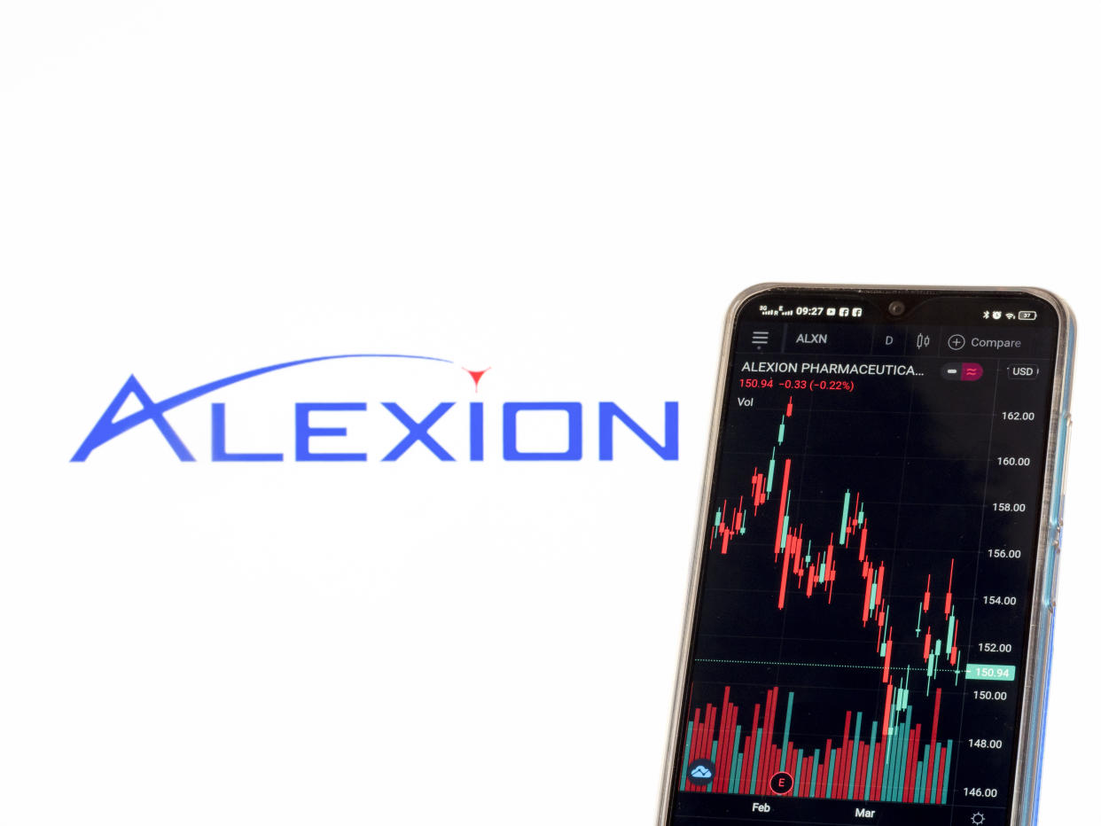 In this photo illustration the stock market information of Alexion Pharmaceuticals Inc. seen displayed on a smartphone with the Alexion Pharmaceuticals Inc. logo in the background. (Photo by Igor Golovniov / SOPA Images/Sipa USA)