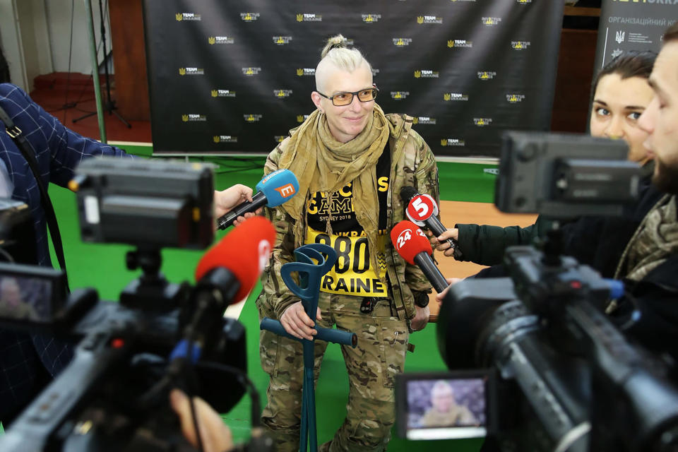 FILE - In this 2018 photo provided by the Invictus Games Team Ukraine, Yuliia Paievska, known as Taira, speaks to the media during trials in Kyiv, Ukraine. She had planned to compete in April 2022 in archery and swimming, and her 19-year-old daughter was permitted to compete in her place instead. (Invictus Games Team Ukraine via AP, File)