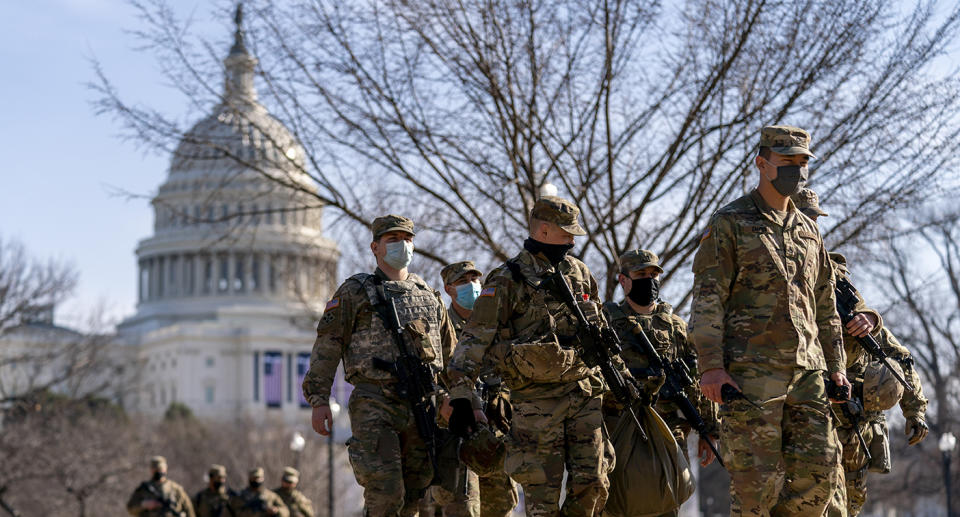 Armed soldiers seen on Washington streets as security is increased ahead of the inauguration. Source: AP