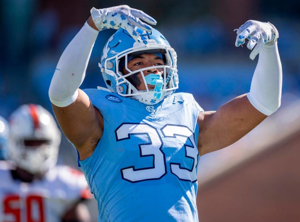 North Carolina’s Cedric Gray (33) reacts after sacking Campbell quarterback Hajj-Malik Williams (6) for a 13-yard loss in the second quarter on Saturday, November 4. 2023 at Kenan Stadium in Chapel Hill, N.C.