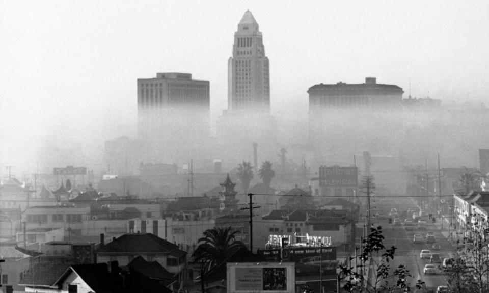 Los Angeles, 1958. On such days, a layer of warm air - temperature inversion - acts as a cover keeping impurities near the ground. Los Angeles officials claim automobiles cause most of the smog. Automotive and gasoline industries have been asked by the city to help in the fight against smog. (AP Photo)