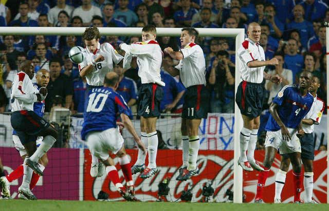 Zinedine Zidane scores the winning goal for France against England in injury time