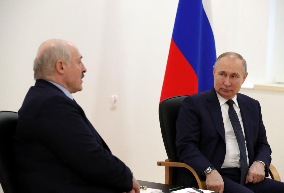 Russia's President Vladimir Putin (R) speaks with Belarus President Alexander Lukashenko during their talks at the engineering building of the technical complex of the Soyuz-2 space rocket complex at the Vostochny Cosmodrome, some 180 km north of Blagoveschensk, Amur region, on April 12, 2022. (Photo by Mikhail KLIMENTYEV / Sputnik / AFP) (Photo by MIKHAIL KLIMENTYEV/Sputnik/AFP via Getty Images)