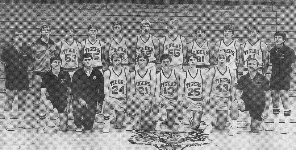 Warsaw Tigers, 1984 State Champions. Front row: Assistant Coach Jerry Ryman, Manager Scott Lee, Jeff Tucker, Tracy Furnivall, Scott Long, Steve Hollar, Jeff Grose, Assistant Coach Dennis VanDuyne. Back Row: Assiistant Coach Pete Smith, Coach Al Rhodes, Mike Norris, Mike Hall, Rob Randaels, Marty Lehmann, Greg Marsh, Joe Sands, Robert Johnson, Mike Lynch, Assistant coach Hal Gunter. 