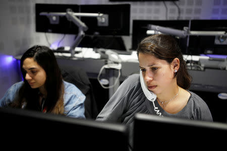 Employees, mostly veterans of military computing units, work at a cyber hotline facility at Israel's Computer Emergency Response Centre (CERT) in Beersheba, southern Israel February 14, 2019. REUTERS/Amir Cohen