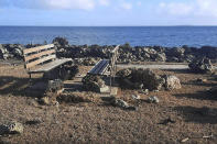 This photo provided by Broadcom Broadcasting shows a damaged area in Nuku'alofa, Tonga, Thursday, Jan. 20, 2022, following Saturday's volcanic eruption near the Pacific archipelago. The first flight carrying fresh water and other aid to Tonga was finally able to leave Thursday after the Pacific nation's main airport runway was cleared of ash left by the eruption. (Marian Kupu/Broadcom Broadcasting via AP)