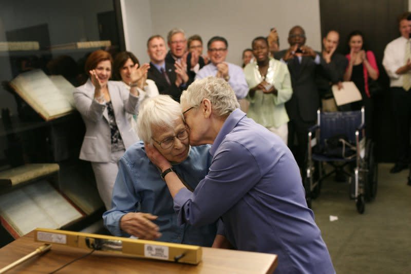 Phyllis Siegel, 76, (R) kisses her wife Connie Kopelov, 84, after exchanging vows at the Manhattan City Clerk's office on the first day New York State's Marriage Equality Act went into effect July 24, 2011. File Photo by Michael Appleton/Pool