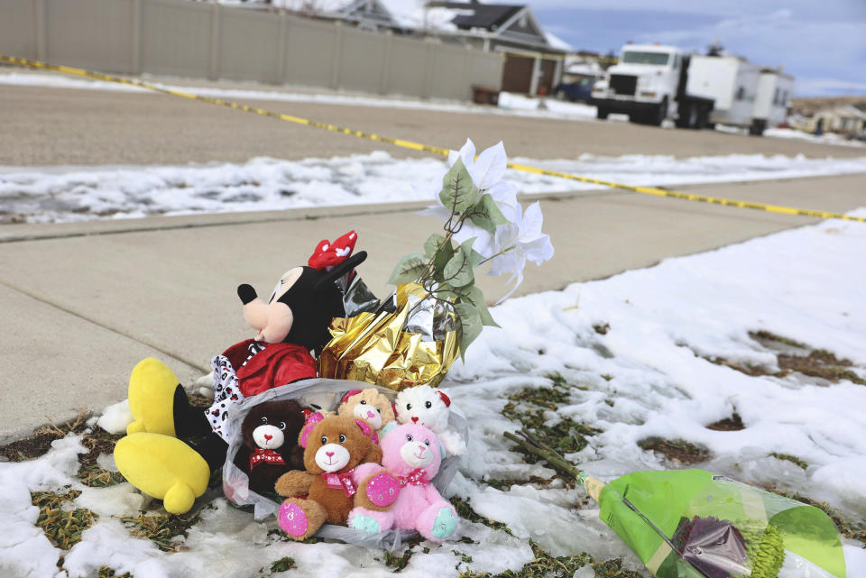 FILE - Five stuffed animals left by the the Enoch Elementary School PTA are pictured at a makeshift memorial near the police tape at a home where eight members of a family were killed in Enoch, Utah, on Thursday, Jan. 5, 2023. A Utah man fatally shot his five children, his mother-in-law and his wife, then killed himself two weeks after the woman had filed for divorce, according to authorities and public records. The U.S. is setting a record pace for mass killings in 2023, replaying the horror in a deadly loop roughly once a week so far this year. The bloodshed overall represents just a fraction of the deadly violence that occurs in the U.S. annually. (Laura Seitz/The Deseret News via AP, File)
