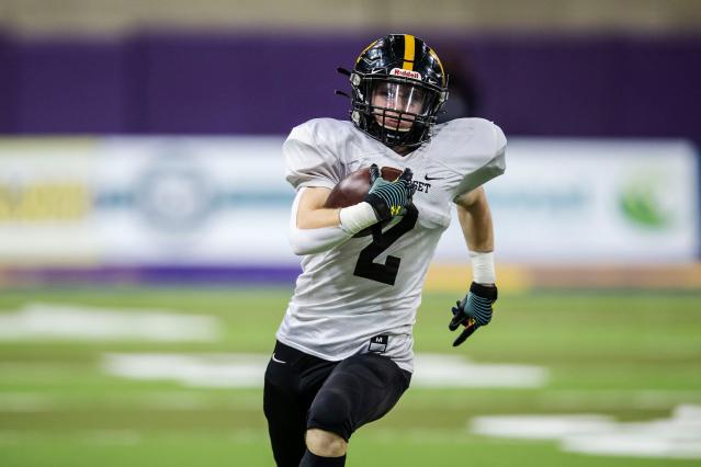 Bettendorf great Pat Angerer kicks off The Score with help from his former  head coach