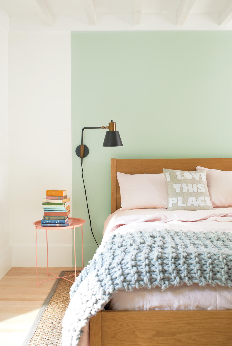 <p> If there's one room where we need to feel calm, it's the bedroom, so any green bedrooms are a great way to go. For many of us, the thought of an all-over color is too much. So if you'd be happier sticking with a neutral backdrop, think creatively to find a space where you could create an accent. Here, a block of soft pastel green has been painted to create the effect of an extended headboard, framing the bed and giving the room a clear central focal point.  </p>