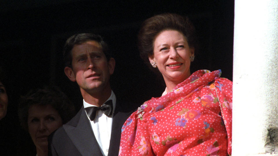 Princess Margaret and Prince Charles watch the Queen Mother during her 90th birthday tribute in London. (Photo by PA Images via Getty Images)