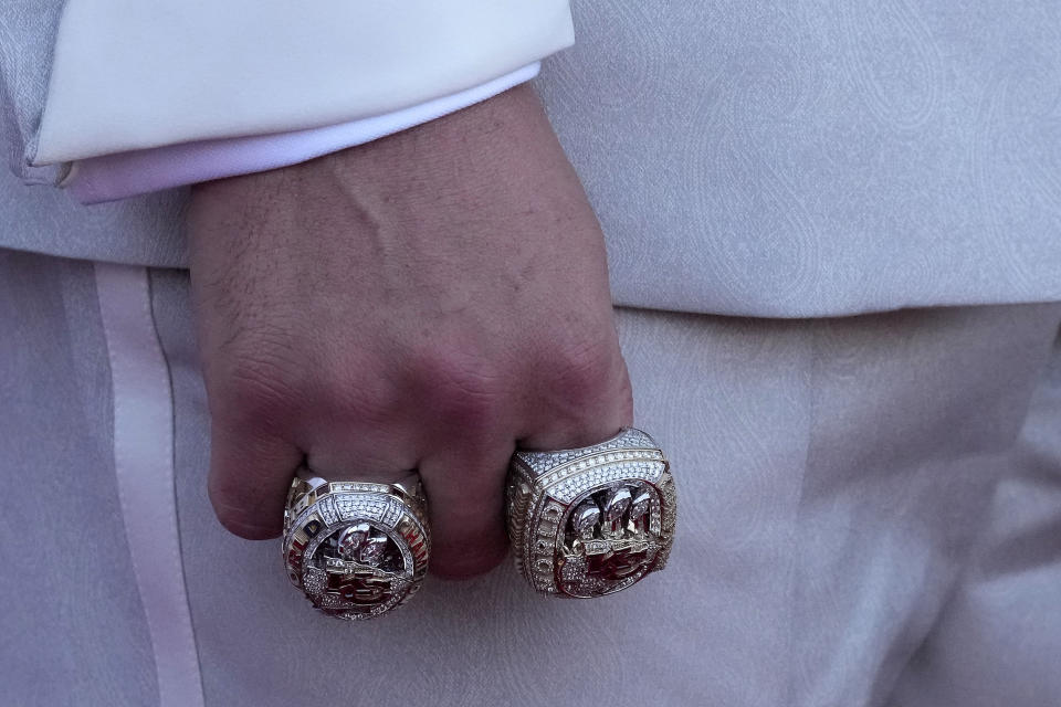 Kansas City Chiefs kicker Harrison Butker arrives on the red carpet before a ceremony for team members to receive their championship rings for winning NFL's Super Bowl 58 football game Thursday, June 13, 2024, in Kansas City, Mo. (AP Photo/Charlie Riedel)