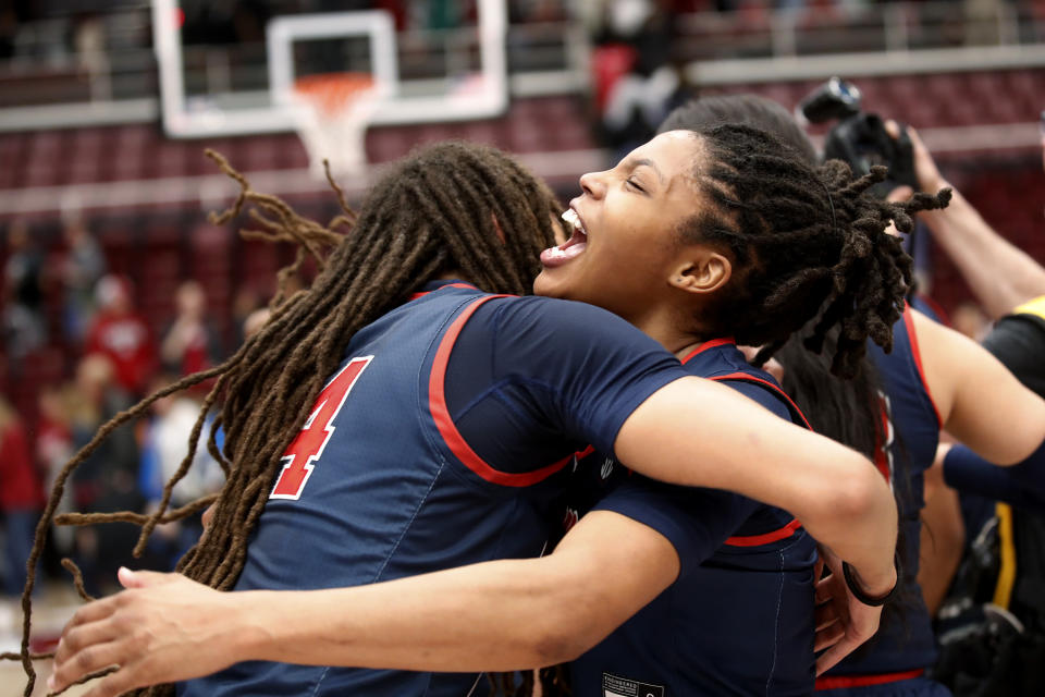 Ole Miss forward Madison Scott celebrates with guard Angel Baker after stunning No. 1-seeded Stanford in the second round of the women's NCAA tournament on March 19, 2023, in Stanford, California. (AP Photo/Josie Lepe)