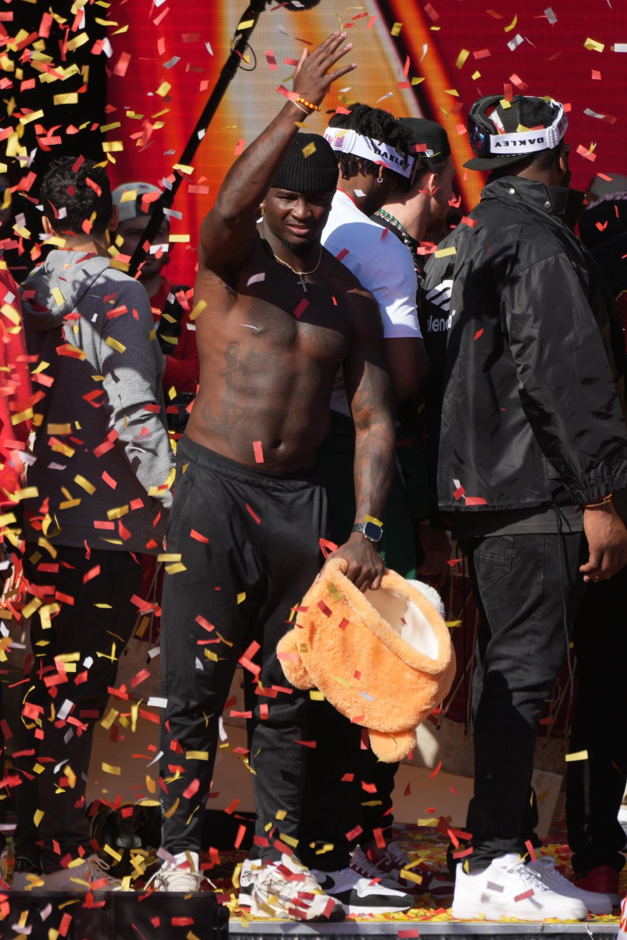 Feb 14, 2024; Kansas City, MO, USA; Kansas City Chiefs linebacker Willie Gay (50) celebrates on stage during the celebration of the Kansas City Chiefs winning Super Bowl LVIII. Mandatory Credit: Kirby Lee-USA TODAY Sports