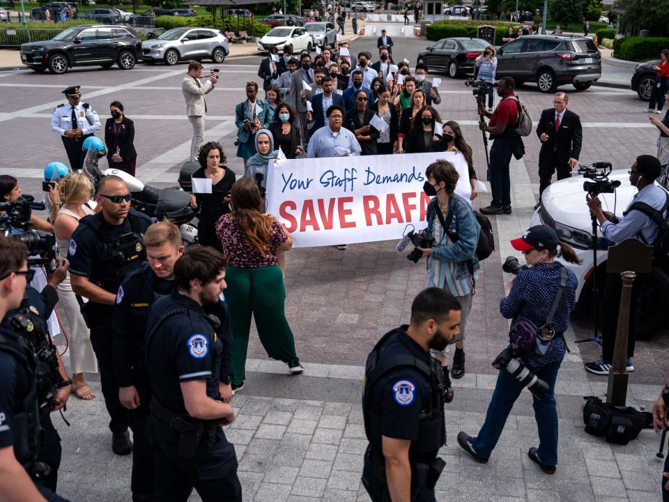 Pro-ceasefire staffers marching toward the House steps ahead of a vote on an Israel aid-related bill on May 16.