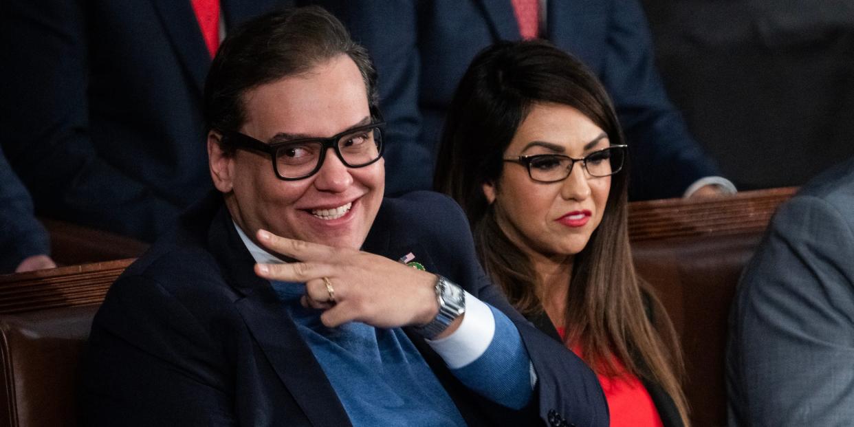 Reps. George Santos and Lauren Boebert on the House floor on October 17, 2023.