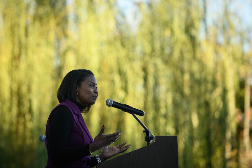 Elenah Kelly speaks at the Remember My Name domestic violence vigil at Festival Park on Thursday, Oct. 6, 2022.