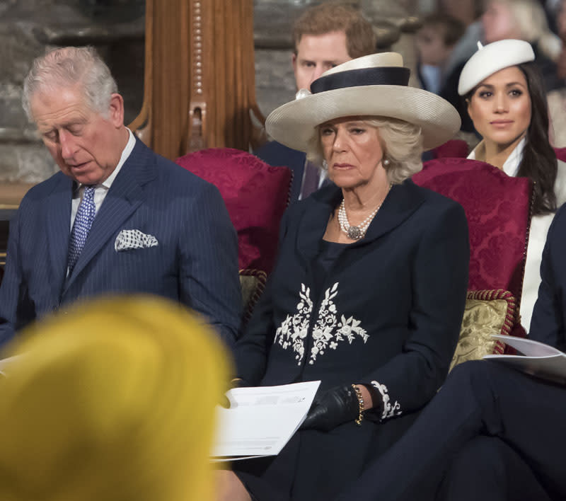 Carlos y Camilla de Inglaterra con Meghan Markle y el príncipe Harry