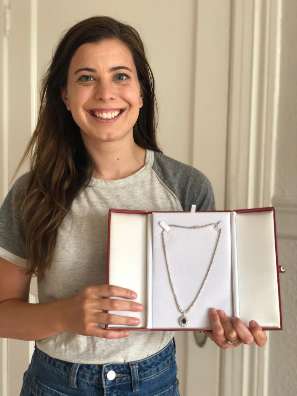 Demi Skipper, 29, holds up a recent trade. In exchange for a 2006 Mini Cooper convertible, Skipper received a diamond-and-sapphire necklace valued at $19,500. Unfortunately, 10 different jewelers inspected the necklace and valued it at only $2,500. Skipper was able to trade it for a Peloton exercise bike and is now trying to get the attention of Paris Hilton. This would mark her first celebrity trade. 
 (Courtesy Demi Skipper)