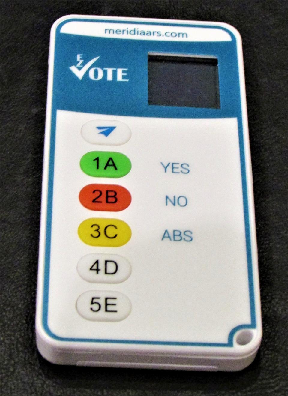 Voting at Bourne's special town meeting on Monday night was expedited by digital devices.