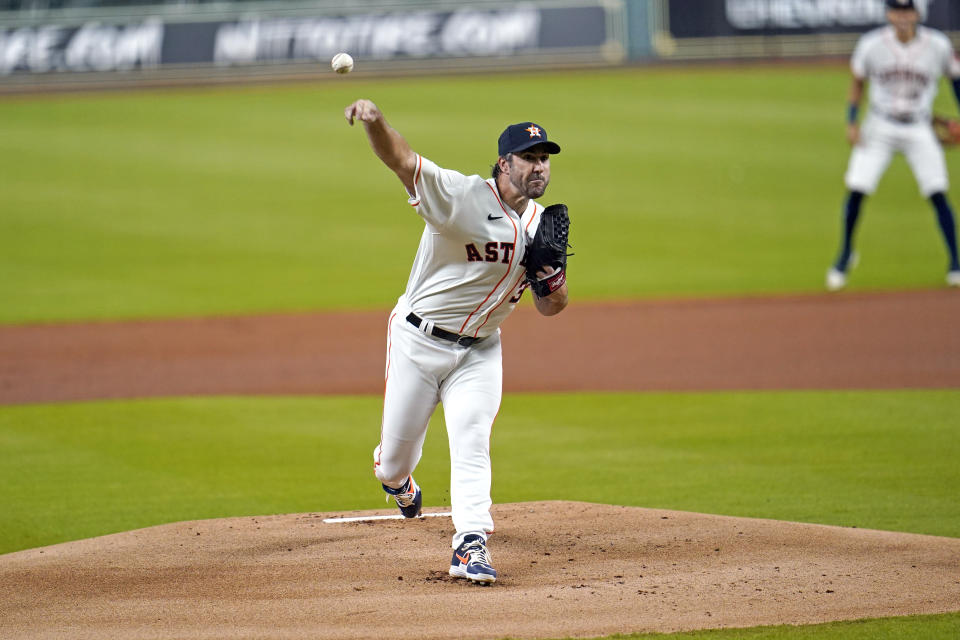 Houston Astros starting pitcher Justin Verlander throws against the Seattle Mariners during the first inning of a baseball game Friday, July 24, 2020, in Houston. (AP Photo/David J. Phillip)