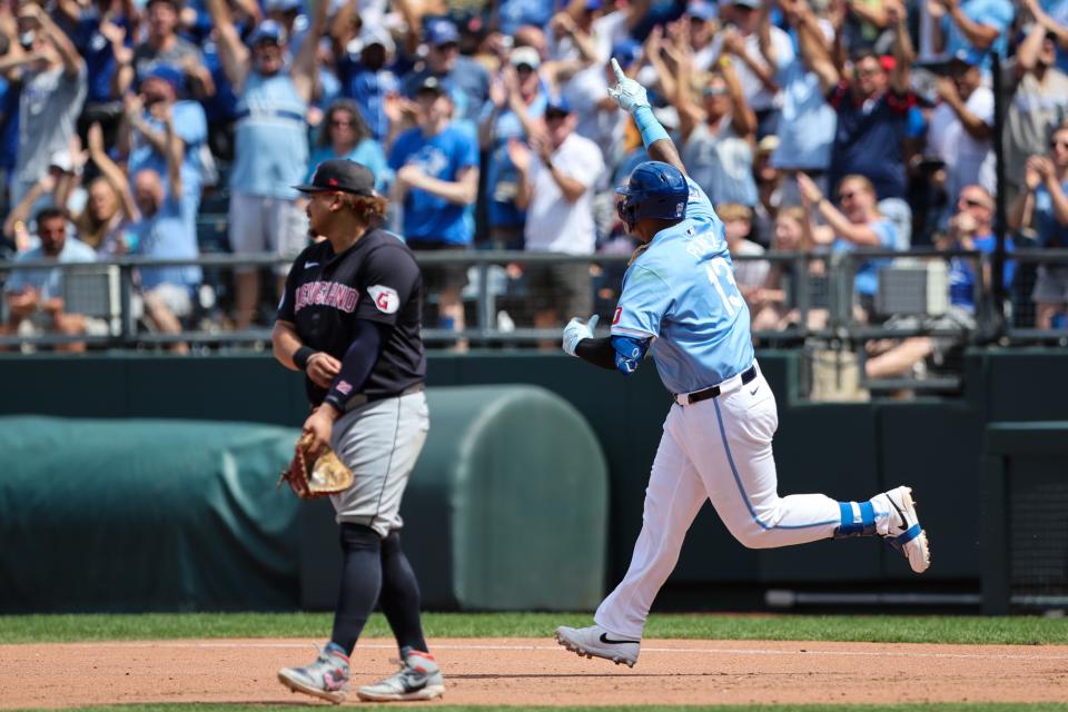 Kansas City Royals catcher Salvador Perez (13) rounds first base after hitting a home run against the Cleveland Guardians on Sunday in Kansas City, Missouri.