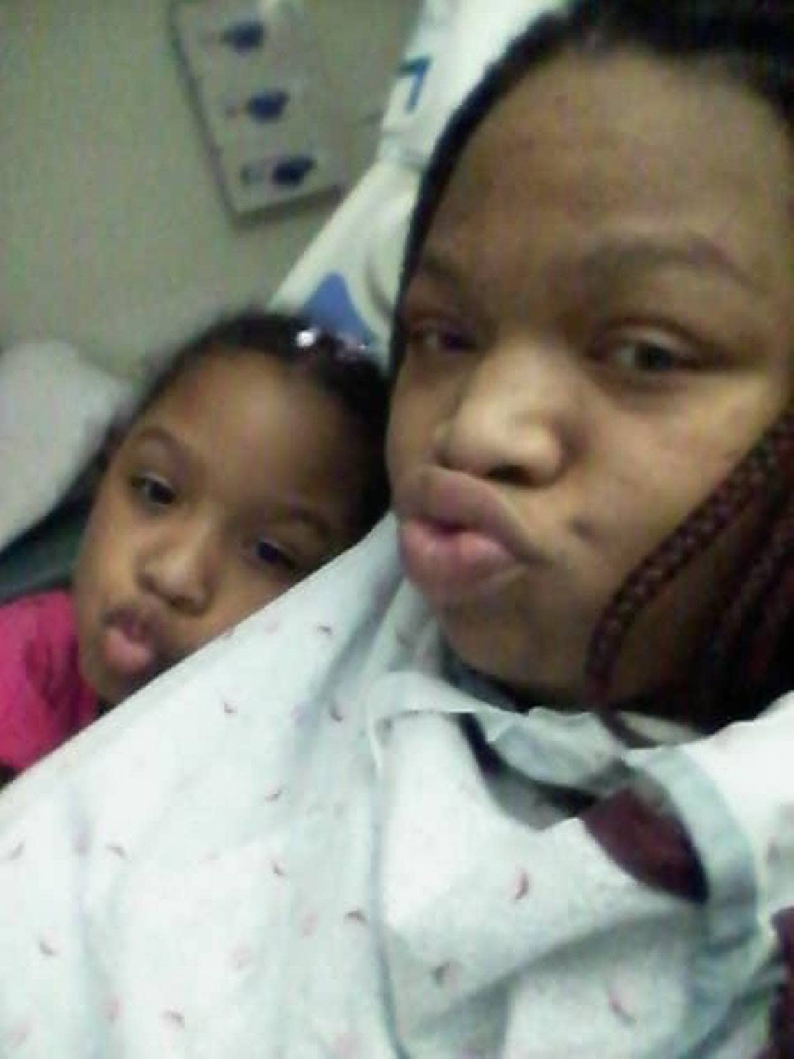 Brianna Grant with her oldest child, RaKiyah, during one of her hospital visits.