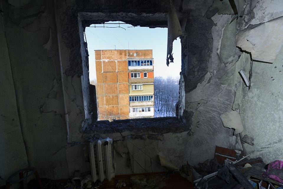 A view from a destroyed window after a shell hit an apartment block building in Donetsk on Dec. 2, 2014. <a href="https://www.gettyimages.com/detail/news-photo/view-from-a-destroyed-window-after-a-shell-hit-an-apartment-news-photo/459826320?phrase=2014%20donetsk%20airport&adppopup=true" rel="nofollow noopener" target="_blank" data-ylk="slk:Eric Feferberg/AFP via Getty Images;elm:context_link;itc:0;sec:content-canvas" class="link ">Eric Feferberg/AFP via Getty Images</a>