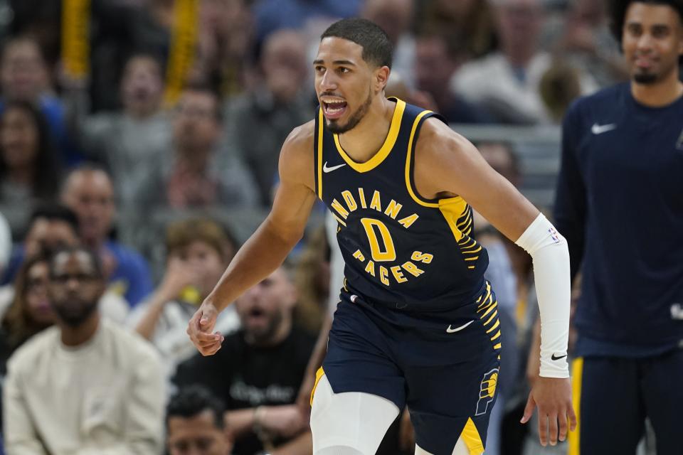 Indiana Pacers' Tyrese Haliburton reacts during the second half of an NBA basketball game against the Utah Jazz, Wednesday, Nov. 8, 2023, in Indianapolis. (AP Photo/Darron Cummings)