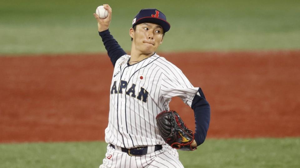 Aug 4, 2021; Yokohama, Japan; Team Japan pitcher Yoshinobu Yamamoto (17) throws a pitch against Korea in a baseball semifinal match during the Tokyo 2020 Olympic Summer Games at Yokohama Baseball Stadium.