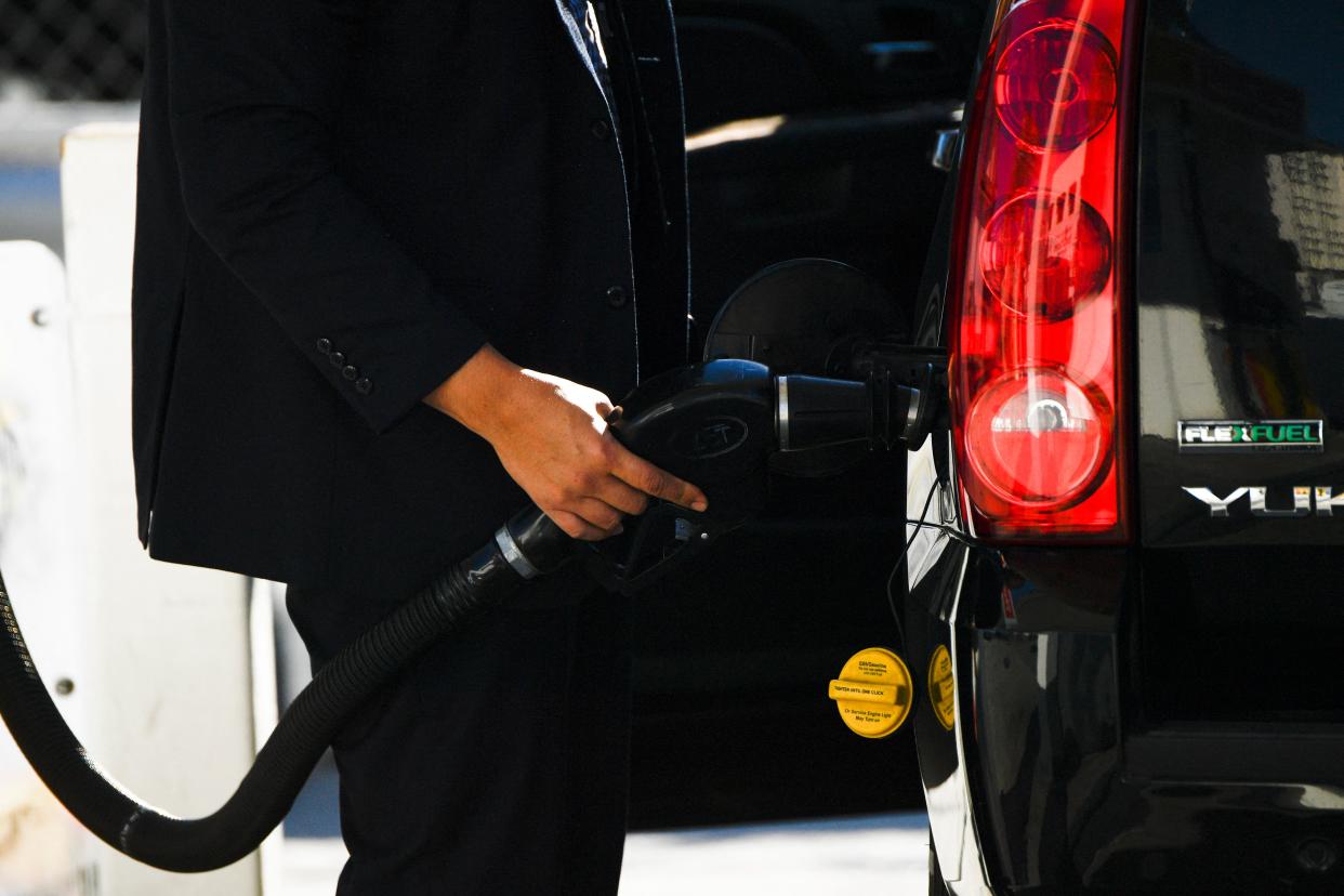 A customer pumps gasoline into an sport utility vehicle (SUV) at a Shell gas station in the Chinatown neighborhood of Los Angeles, California, on February 17, 2022. - In Los Angeles County, a new record for gas prices has now been set for the 11th time in 12 days.
The average price of a gallon of self-serve regular is now $4.77 per gallon, up more than 10 cents over the past 16 days. (Photo by Patrick T. FALLON / AFP) (Photo by PATRICK T. FALLON/AFP via Getty Images)
