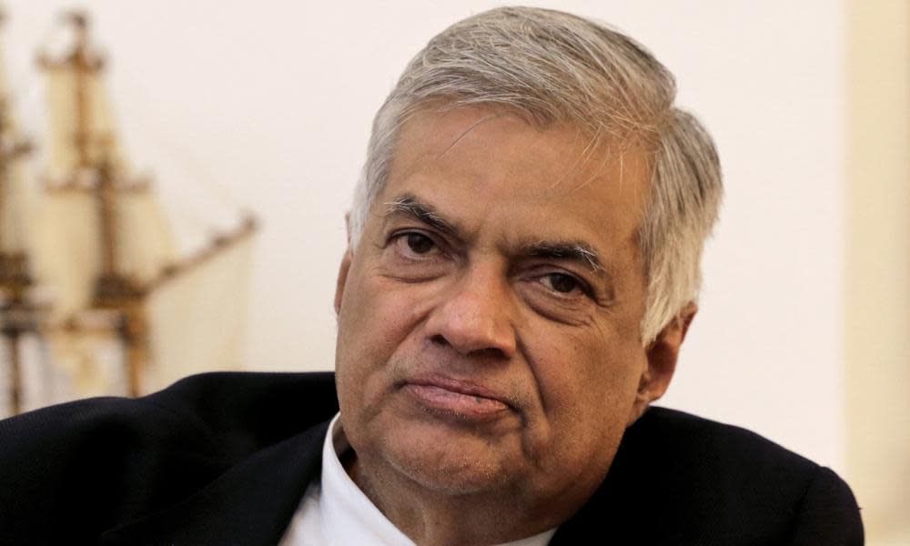 Sri Lanka’s president has reappointed Ranil Wickremesinghe as prime minister, nearly two months after firing him.