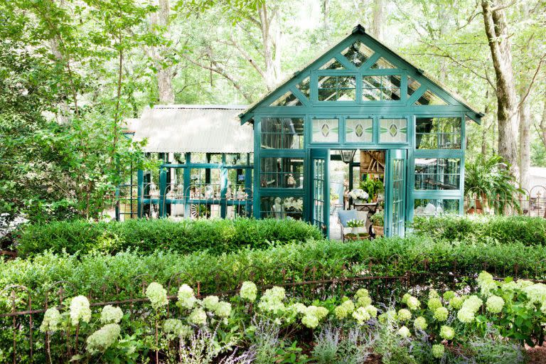 <p>If you're doing a lot of repotting plants, consider building (or refurbishing) a shed into a more beautiful place to do it. It has the advantage of moving the mess out of your main house!</p><p><strong><a href="https://www.countryliving.com/home-design/a37803/gardening-chic-shed/" rel="nofollow noopener" target="_blank" data-ylk="slk:Read more about this chic garden shed;elm:context_link;itc:0;sec:content-canvas" class="link ">Read more about this chic garden shed</a>.</strong></p><p><a class="link " href="https://go.redirectingat.com?id=74968X1596630&url=https%3A%2F%2Fwww.etsy.com%2Fsearch%2Fvintage%3Fq%3Dterra%2Bcotta%2Bpots&sref=https%3A%2F%2Fwww.countryliving.com%2Fgardening%2Fgarden-tours%2Fg1432%2Flandscaping-ideas%2F" rel="nofollow noopener" target="_blank" data-ylk="slk:SHOP TERRA COTTA POTS;elm:context_link;itc:0;sec:content-canvas">SHOP TERRA COTTA POTS</a></p>