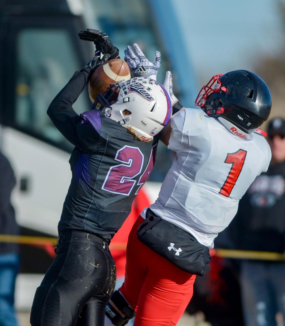 Power/Dutton/Brady's John Baringer makes an interception in front of Froid/ Medicine Lake's Connor Huft during the 6-Player football championship on Saturday in Dutton.