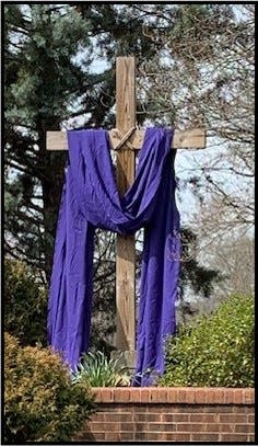 The outdoor cross at Grace Lutheran in Oak Ridge draped for Lenten season.