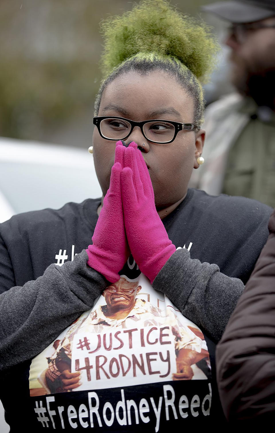 Lakendria Martin listens to a speaker during a protest against the execution of Rodney Reed on Wednesday, Nov. 13, 2019, in Bastrop, Texas. Protesters rallied in support of Reed’s campaign to stop his scheduled Nov. 20 execution for the 1996 killing of a 19-year-old Stacy Stites. New evidence in the case has led a growing number of Texas legislators, religious leaders and celebrities to press Gov. Greg Abbott to intervene. (Nick Wagner/Austin American-Statesman via AP)
