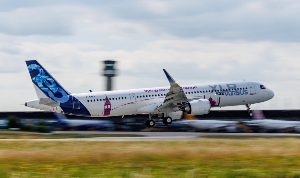 An Airbus A321XLR plane takes off for its first flight from the Airbus plant in Hamburg, northern Germany, on June 15, 2022