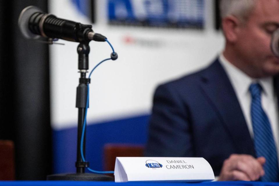 A name plate for Attorney General of Kentucky Daniel Cameron sits on stage during the KSR GOP debate at the old Hard Rock Cafe in Louisville, Ky., Wednesday, April 19, 2023. Cameron did not appear for the event.