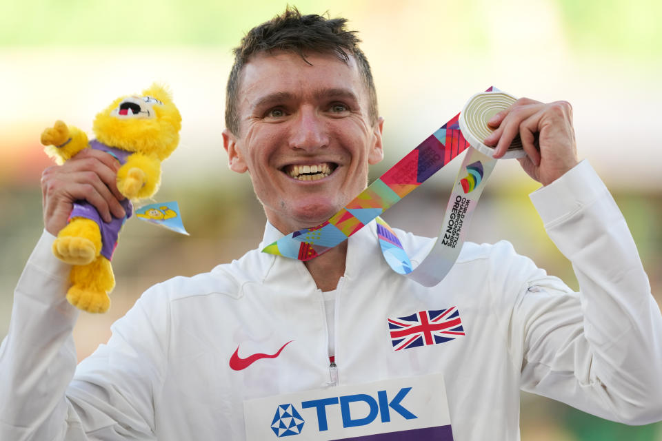 File photo dated 19-07-2022 of Great Britain's Jake Wightman celebrates with his Gold Medal following the Men�s 1500m Final. Jake Wightman clinched a stunning 1500m gold medal at the World Championships - with dad Geoff commentating on his shock victory. Issue date: Wednesday July 20, 2022.
