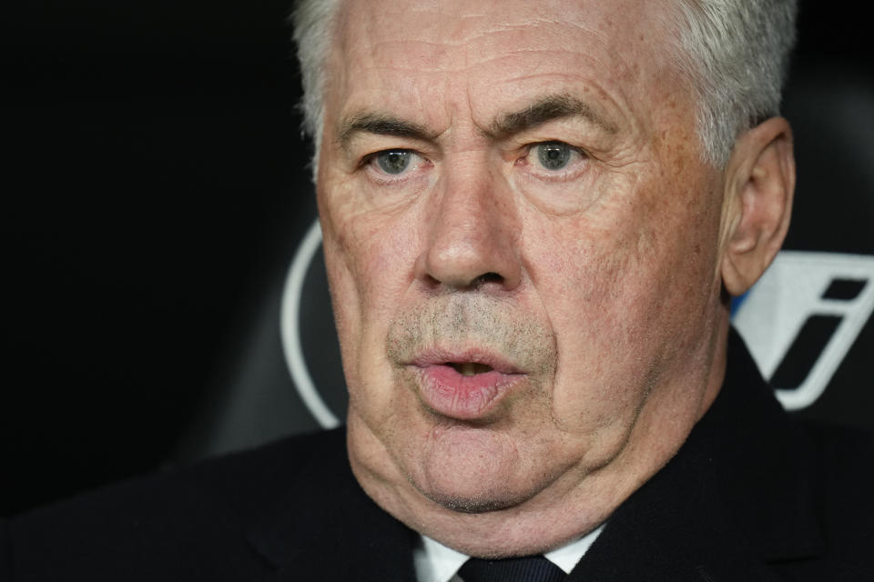 FILE - Real Madrid's head coach Carlo Ancelotti reacts ahead of the Spanish La Liga soccer match between Real Madrid and Sevilla at the Santiago Bernabeu stadium in Madrid, Spain, Sunday, Feb. 25, 2024. Spanish state prosecutors have accused Real Madrid coach Carlo Ancelotti of alleged tax fraud. Prosecutors said in a statement Wednesday, March 6, 2024, that they are accusing Ancelotti of two accounts of tax fraud that would be punishable with four years and nine months of prison. (AP Photo/Manu Fernandez, File)