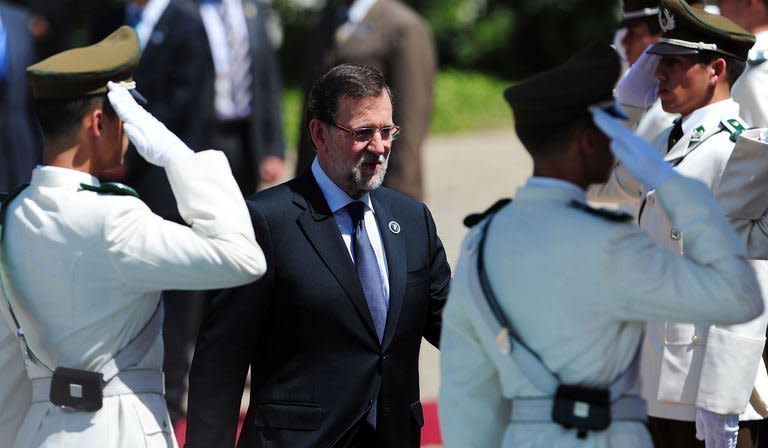 Spanish Prime Minister Mariano Rajoy attends the Latin American and Caribbean States-European Union Summit in Santiago, on January 26, 2013. European and Latin American leaders pledged to shun protectionism and boost their strategic partnership to foster free trade