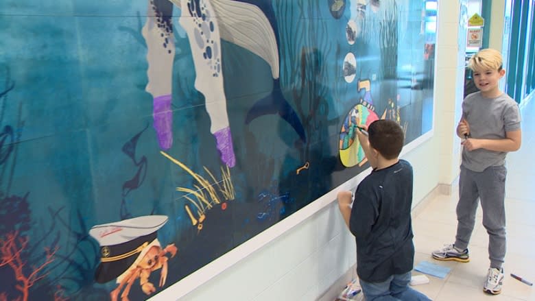 Interactive mural at Saint John school encourages students to make their mark