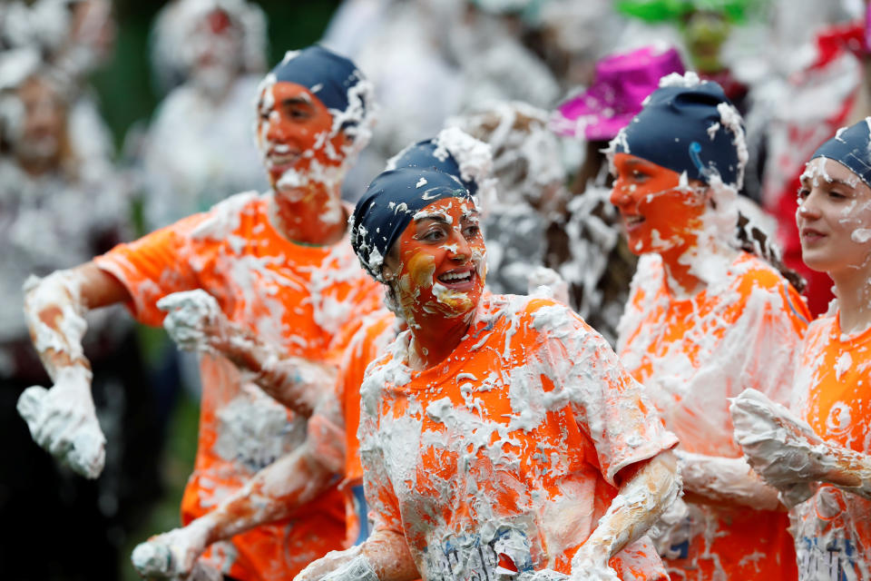 <p>Students from St Andrews University are covered in foam as they take part in the traditional “Raisin Weekend” on Lower College Lawn, at St Andrews, Scotland, Oct. 23, 2017. (Photo: Russell Cheyne/Reuters) </p>