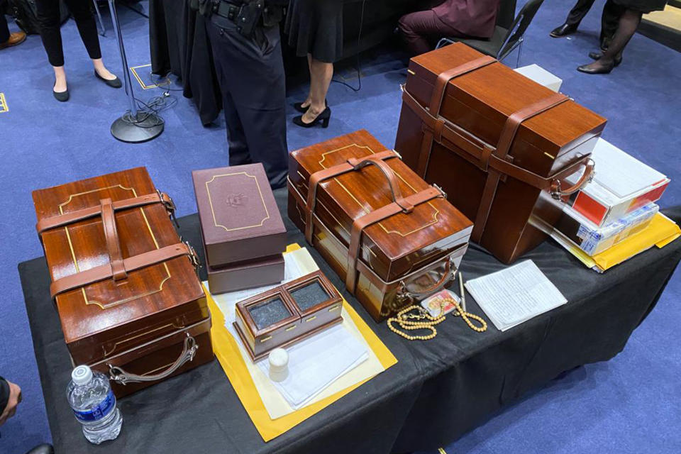 In this photo released by the Office of U.S. Sen. Jeff Merkley, D-Ore, Electoral College ballots sit on a table after they were rescued from the Senate floor in Washington, Wednesday, Jan. 6, 2020. (Office of U.S. Senator Jeff Merkley via AP)