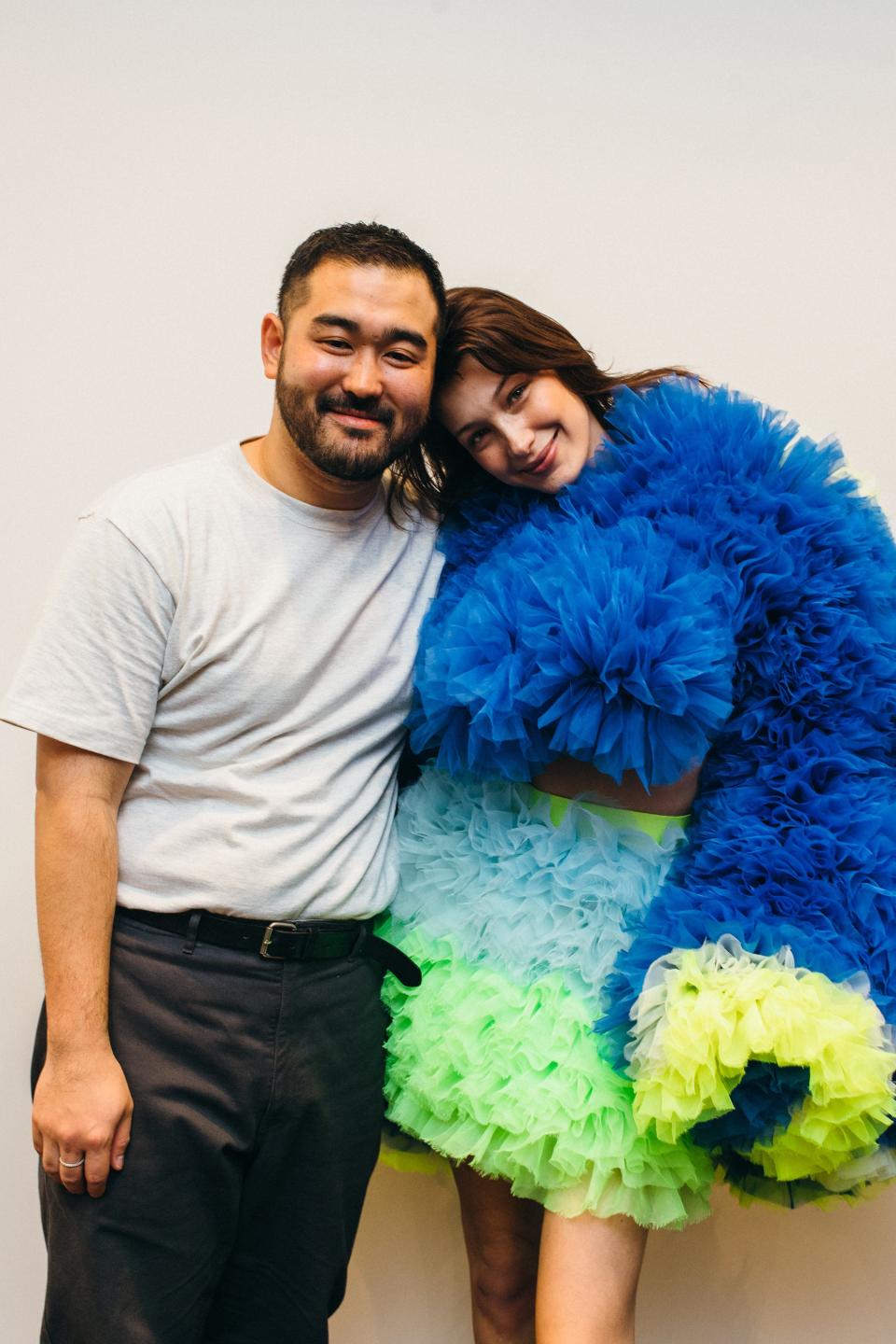 Koizumi and Bella Hadid at her fitting.