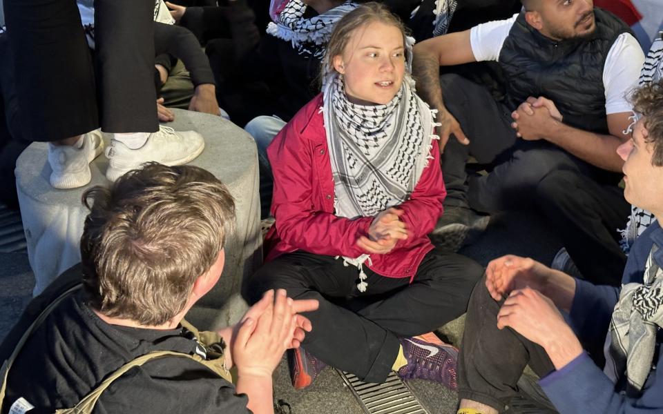 Greta Thunberg joined protesters outside the arena on Saturday night