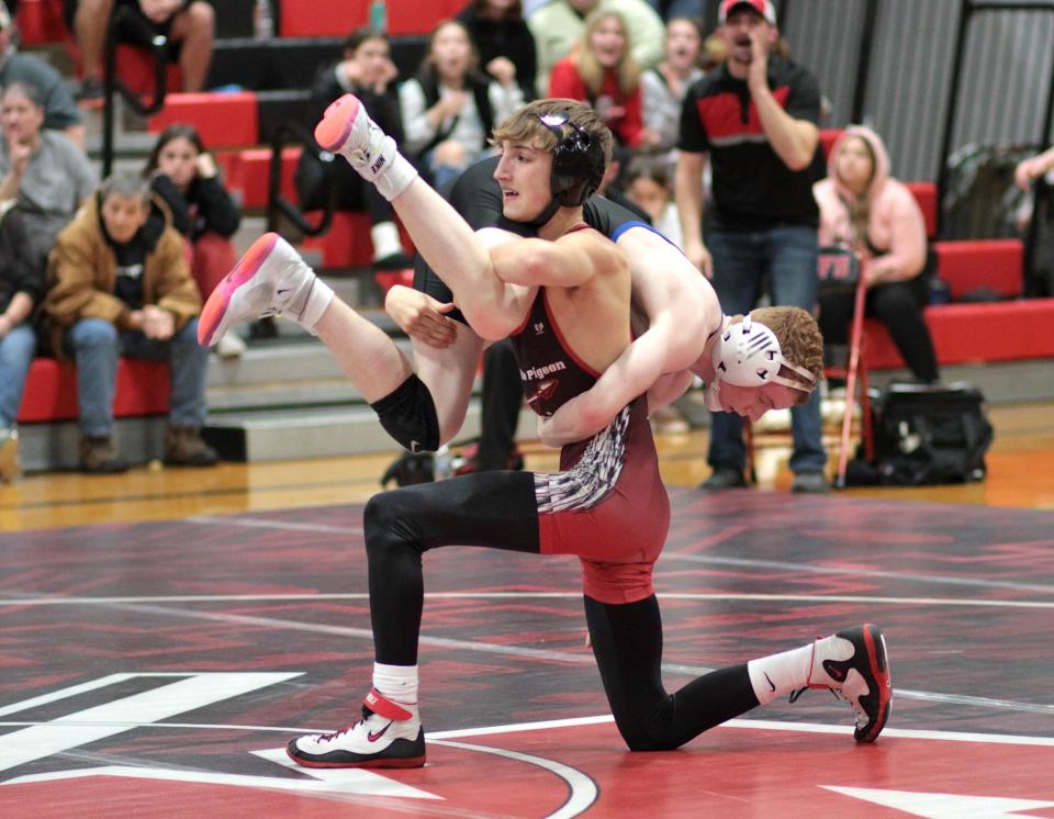 White Pigeon's Mazzy Lambert won both of his bouts on Thursday.