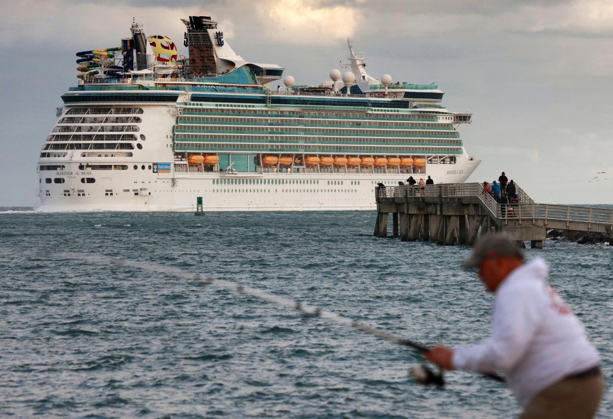 Royal Caribbean's Mariner of the Seas departs Port Canaveral, Fla., on a 4-night Bahamas cruise, Tuesday, Jan. 11, 2021.