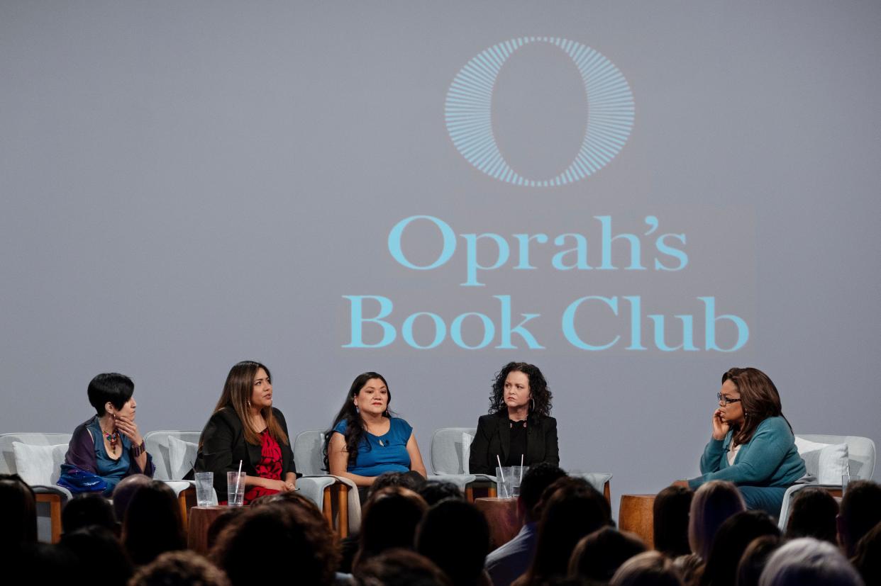 Oprah Winfrey (right) hosts a taping of Oprah's Book Club with Jeanine Cummins, author of "American Dirt" (second right) and panelists (from left) Esther J. Cepeda, Julissa Arce and Reyna Grande in Tuscon, Ariz.