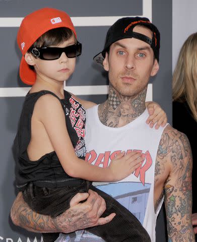 <p>Gregg DeGuire/FilmMagic</p> Landon and Travis Barker at the Grammys in January 2010.